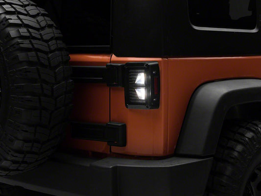 Raxiom Axial Series Vision LED Tail Lights; Black Housing; Smoked Lens (07-18 Jeep Wrangler JK)