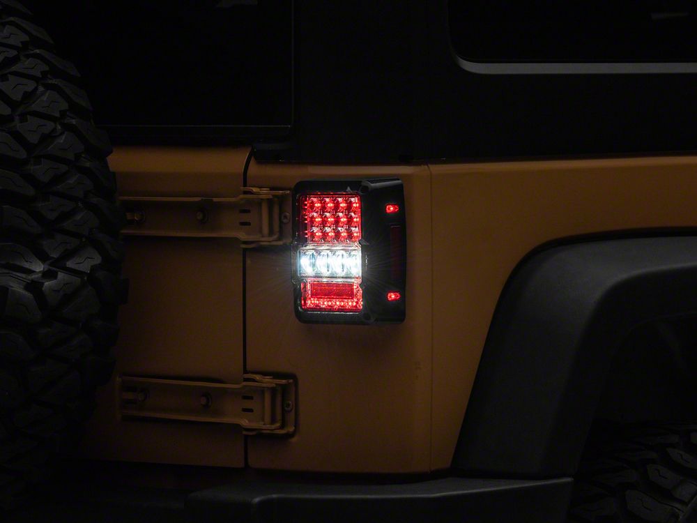 Raxiom Axial Series Lux LED Tail Lights; Black Housing; Clear Lens (07-18 Jeep Wrangler JK)