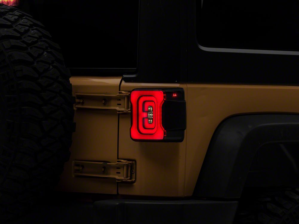 Raxiom Axial Series Carver LED Tail Lights; Black Housing; Smoked Lens (07-18 Jeep Wrangler JK)
