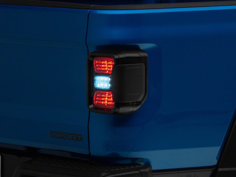 Raxiom LED Tail Lights; Black Housing; Smoked Lens (20-25 Jeep Gladiator JT w/ Factory Halogen Tail Lights & w/o Blind Spot Detection))