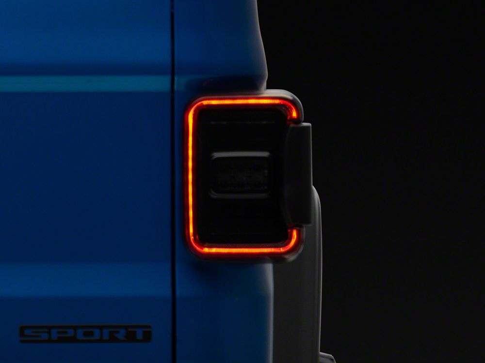 Raxiom LED Tail Lights; Black Housing; Smoked Lens (20-25 Jeep Gladiator JT w/ Factory Halogen Tail Lights & w/o Blind Spot Detection))