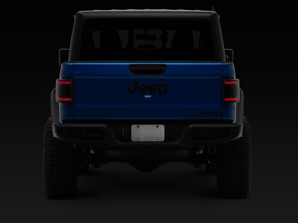 Raxiom Low Profile LED Tail Lights; Black Housing; Smoked Lens (20-25 Jeep Gladiator JT w/ Factory Halogen Tail Lights & w/o Blind Spot Detection))