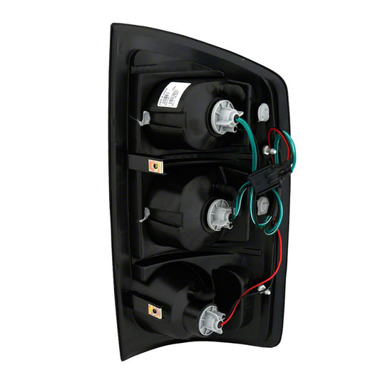 Raxiom Axial Series Tail Lights; Black Housing; Dark Smoked Lens (02-05 RAM 1500)