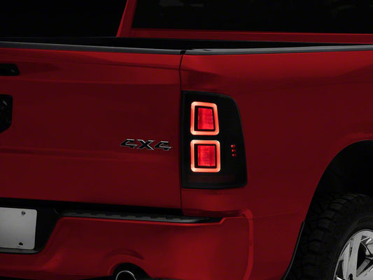 Raxiom LED Tail Lights; Black Housing; Light Smoked Lens (09-18 RAM 1500 w/ Factory Halogen Tail Lights)