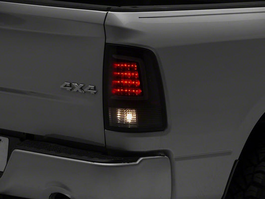 Raxiom Axial Series LED Tail Lights; Black Housing; Smoked Lens (09-18 RAM 1500 w/ Factory Halogen Tail Lights)