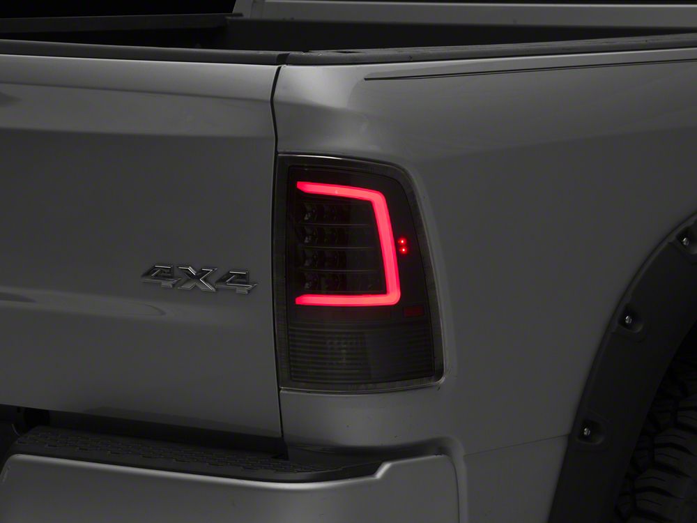 Raxiom Axial Series LED Tail Lights; Black Housing; Clear Lens (09-18 RAM 1500 w/ Factory Halogen Tail Lights)