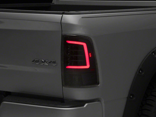 Raxiom Axial Series LED Tail Lights; Black Housing; Clear Lens (09-18 RAM 1500 w/ Factory Halogen Tail Lights)