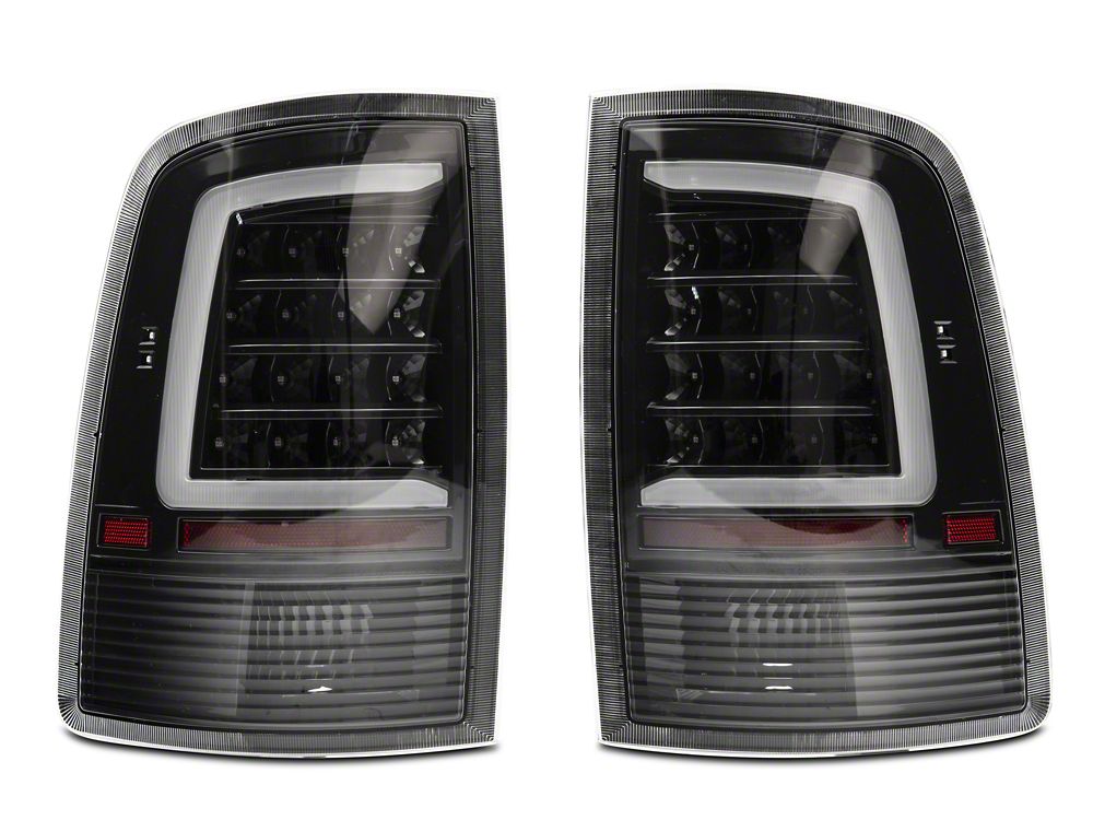 Raxiom Axial Series LED Tail Lights; Black Housing; Clear Lens (09-18 RAM 1500 w/ Factory Halogen Tail Lights)