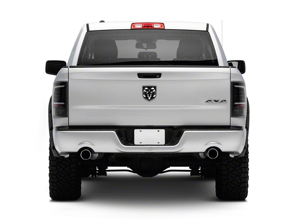 Raxiom Axial Series LED Tail Lights; Black Housing; Clear Lens (09-18 RAM 1500 w/ Factory Halogen Tail Lights)