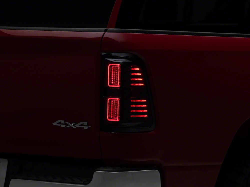 Raxiom CXR Series LED Tail Lights; Black Housing; Smoked Lens (19-24 RAM 1500 w/ Factory Halogen Tail Lights)