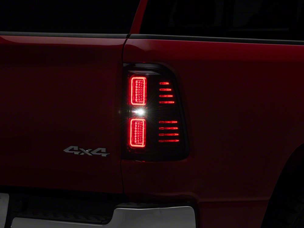 Raxiom CXR Series LED Tail Lights; Black Housing; Smoked Lens (19-24 RAM 1500 w/ Factory Halogen Tail Lights)