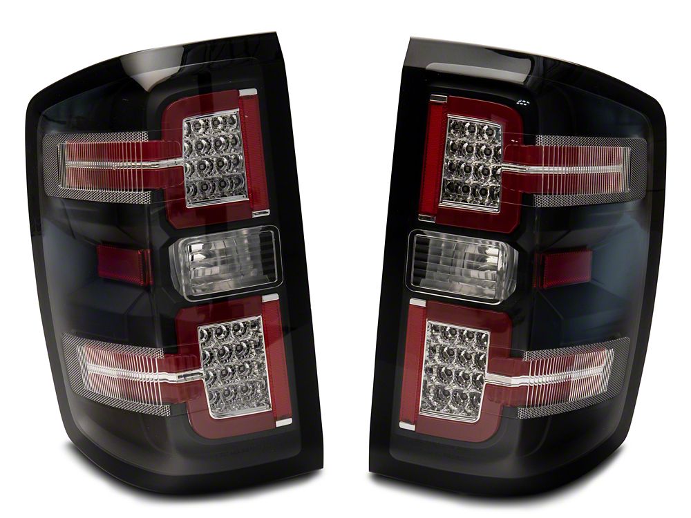 Raxiom LED Tail Lights with Sequential Turn Signals; Black Housing; Clear Lens (14-18 Silverado 1500 w/ Factory Halogen Tail Lights)