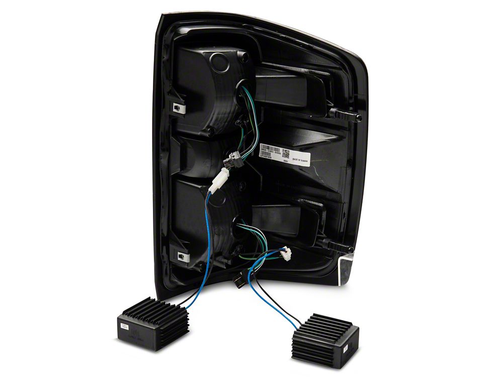 Raxiom LED Tail Lights with Sequential Turn Signals; Black Housing; Clear Lens (14-18 Silverado 1500 w/ Factory Halogen Tail Lights)