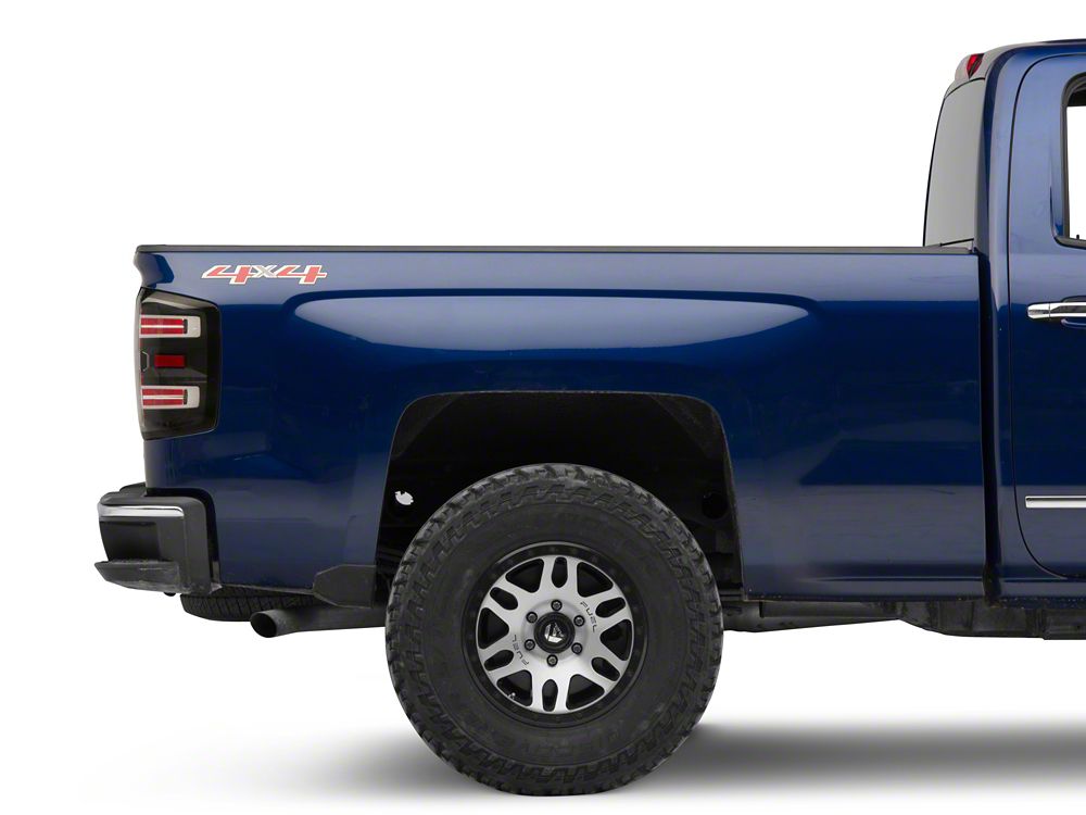 Raxiom LED Tail Lights with Sequential Turn Signals; Black Housing; Clear Lens (14-18 Silverado 1500 w/ Factory Halogen Tail Lights)