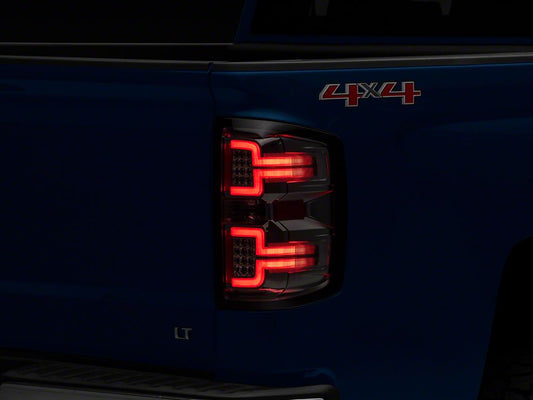 Raxiom LED Tail Lights with Sequential Turn Signals; Chrome Housing; Smoked Lens (14-18 Silverado 1500 w/ Factory Halogen Tail Lights)