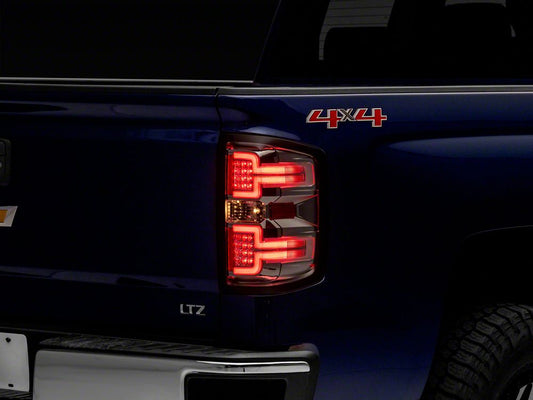 Raxiom LED Tail Lights with Sequential Turn Signals; Chrome Housing; Clear Lens (14-18 Silverado 1500 w/ Factory Halogen Tail Lights)