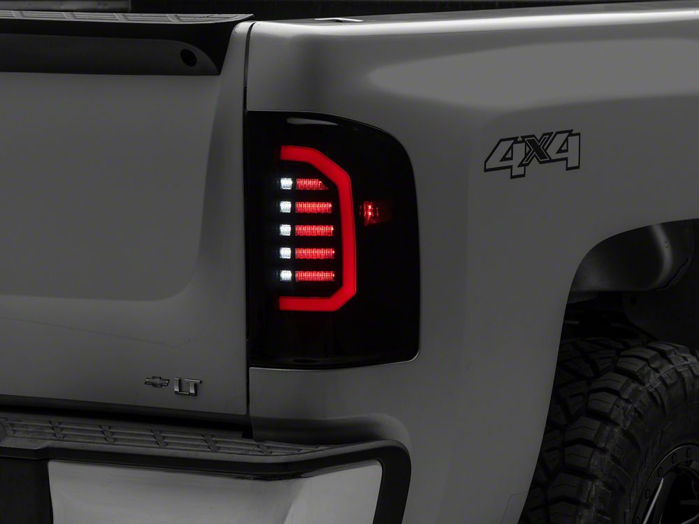 Raxiom Axial Series LED Tail Lights; Black Housing; Smoked Lens (07-13 Silverado 1500)