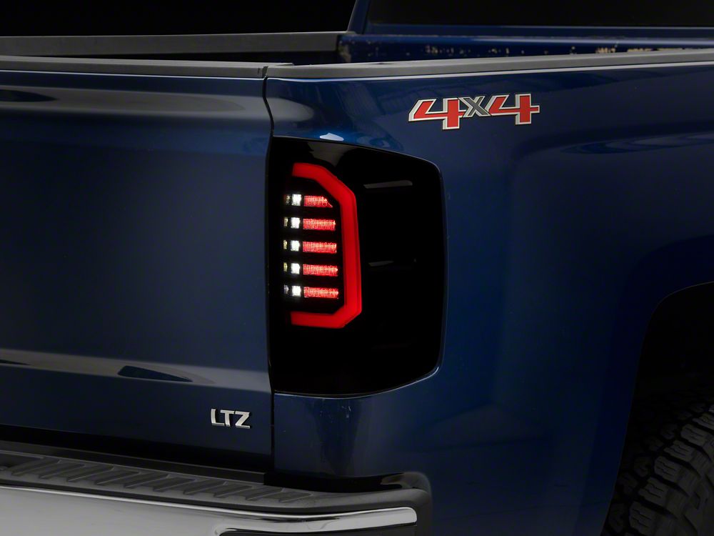 Raxiom Axial Series LED Tail Lights; Black Housing; Smoked Lens (16-18 Silverado 1500 w/ Factory Halogen Tail Lights)