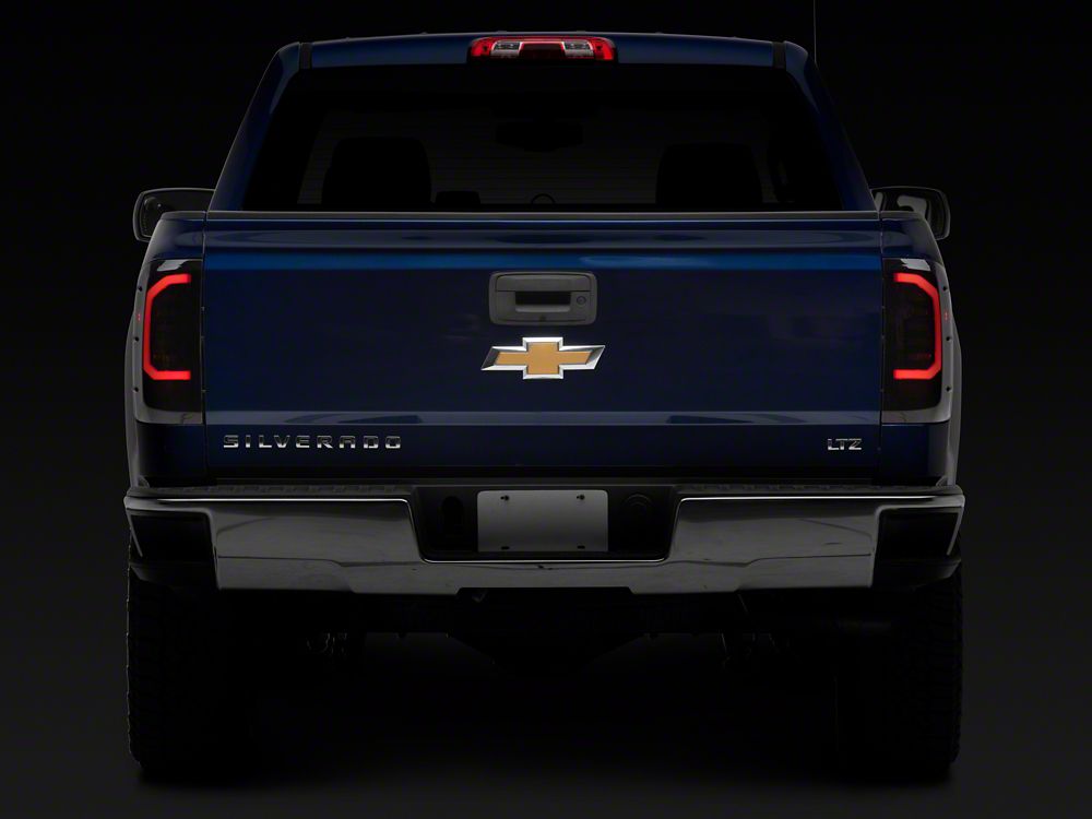 Raxiom Axial Series LED Tail Lights; Black Housing; Smoked Lens (16-18 Silverado 1500 w/ Factory Halogen Tail Lights)