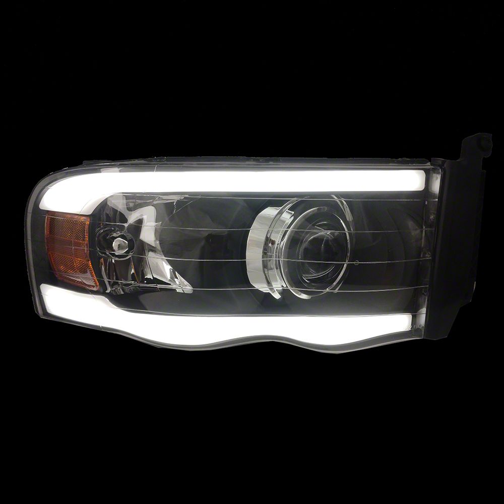 Raxiom Axial Series Projector Headlights with LED Bar; Black Housing; Clear Lens (03-05 RAM 3500)