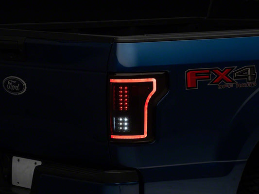 Raxiom LED Tail Lights with Sequential Turn Signals; Black Housing; Clear Lens (15-17 F-150 w/ Factory Halogen Non-BLIS Tail Lights)