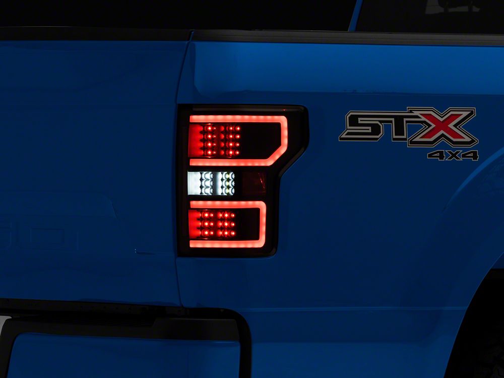 Raxiom Axial Series LED Tail Lights with Sequential Turn Signals; Black Housing; Clear Lens (18-20 F-150 w/ Factory Halogen Non-BLIS Tail Lights)