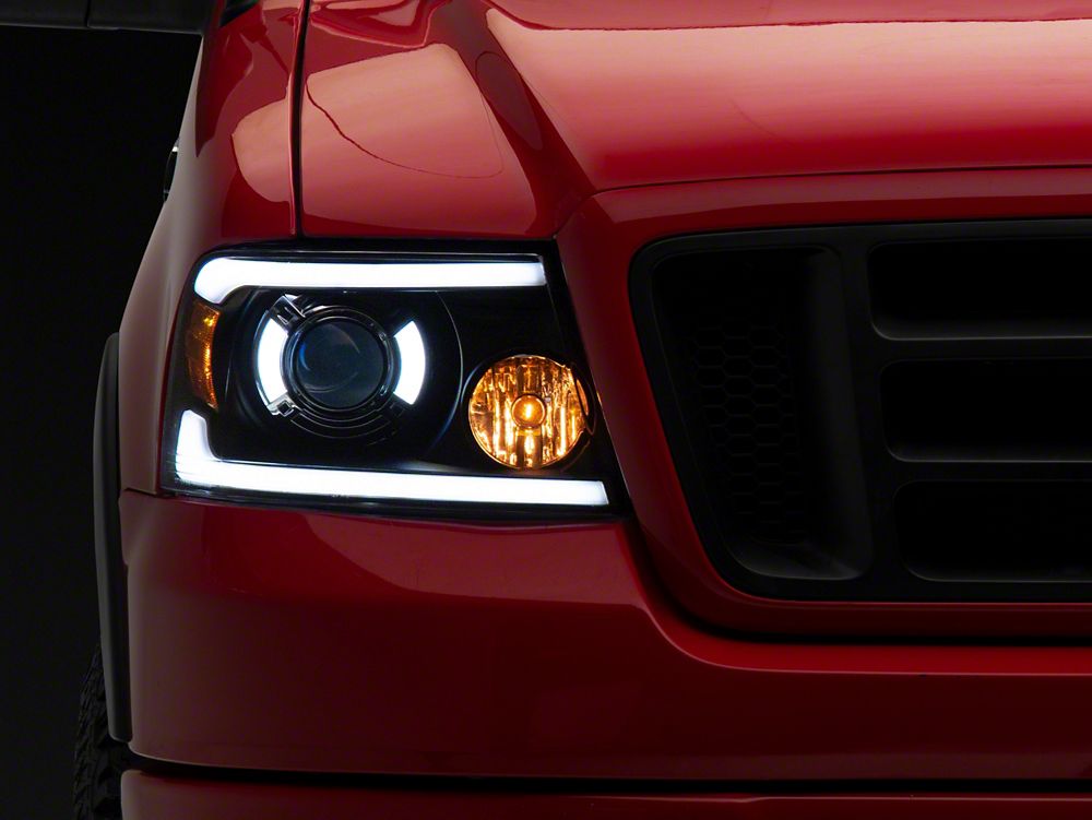 Raxiom Axial Series Projector Headlights with LED Bar; Black Housing; Clear Lens (04-08 F-150)