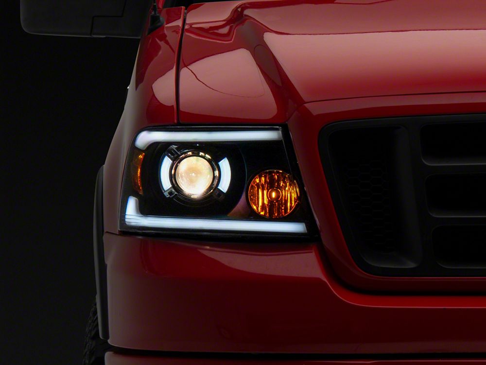 Raxiom Axial Series Projector Headlights with Sequential LED Bar; Black Housing; Clear Lens (04-08 F-150)