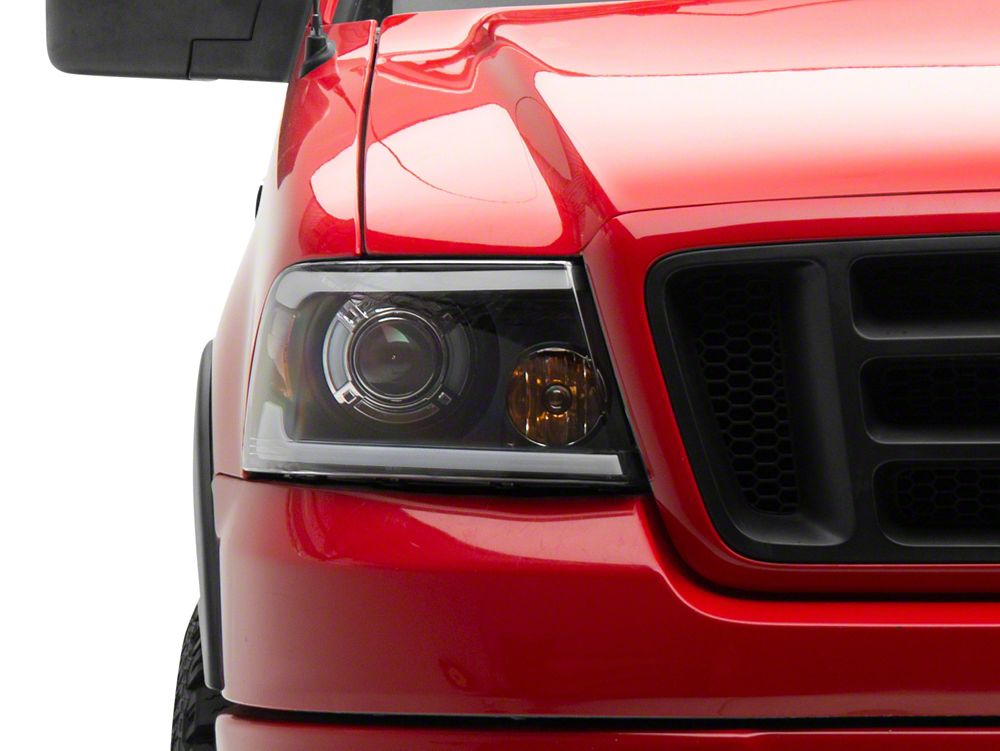 Raxiom Axial Series Projector Headlights with Sequential LED Bar; Black Housing; Clear Lens (04-08 F-150)