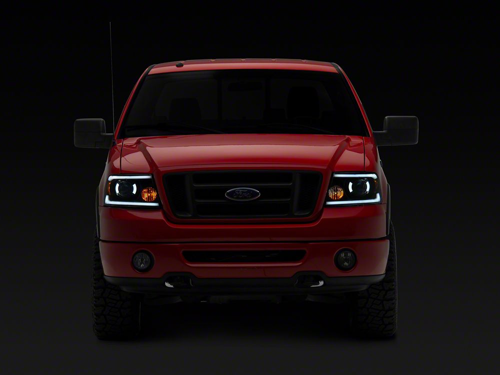 Raxiom Axial Series Projector Headlights with Sequential LED Bar; Black Housing; Clear Lens (04-08 F-150)
