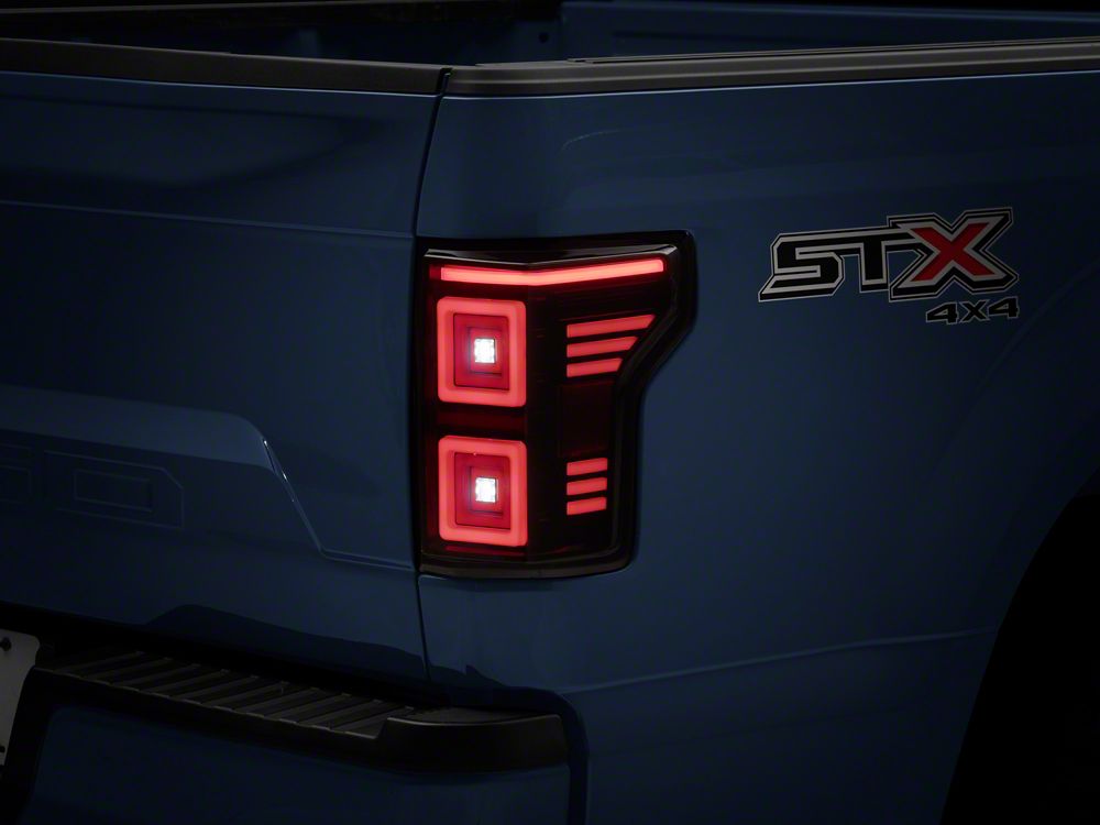 Raxiom Horizon LED Tail Lights; Black Housing; Clear Lens (15-20 F-150 w/ Factory Halogen Non-BLIS Tail Lights)