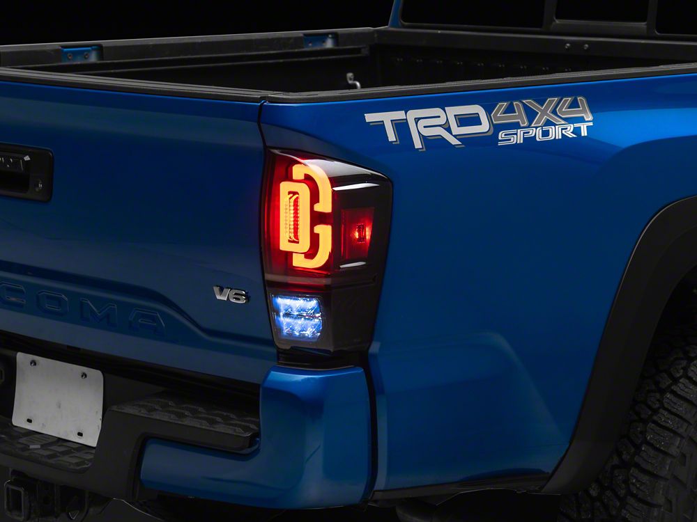 Raxiom XW Series Sequential LED Tail Lights; Black Housing, Smoked Lens (16-23 Tacoma)