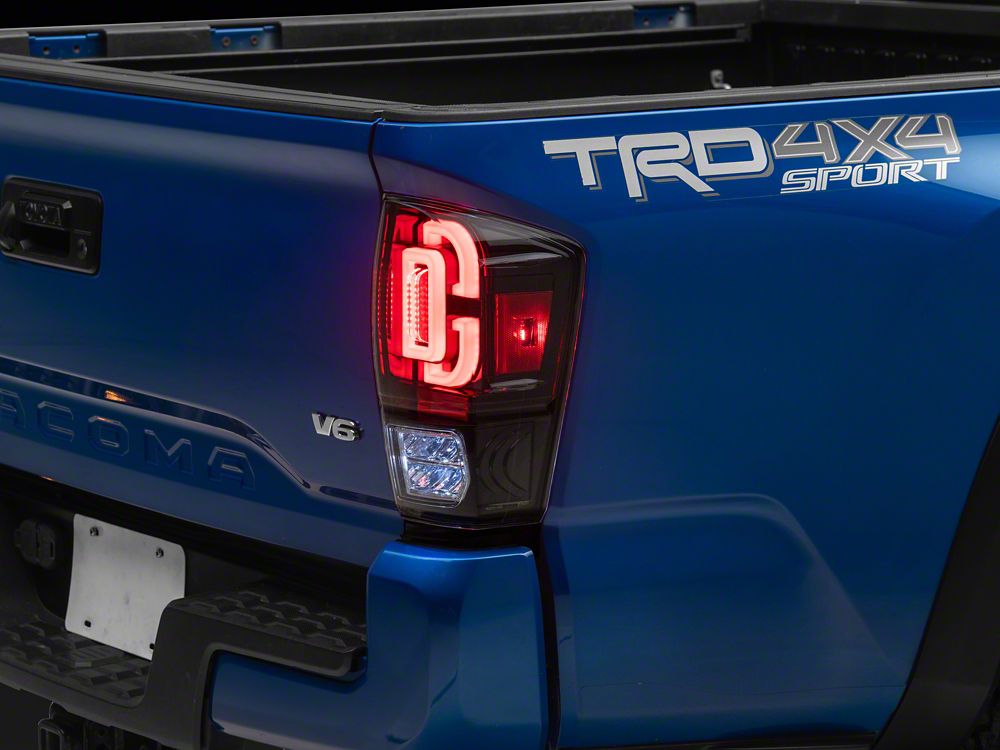 Raxiom XW Series Sequential LED Tail Lights; Black Housing; Clear Lens (16-23 Tacoma)