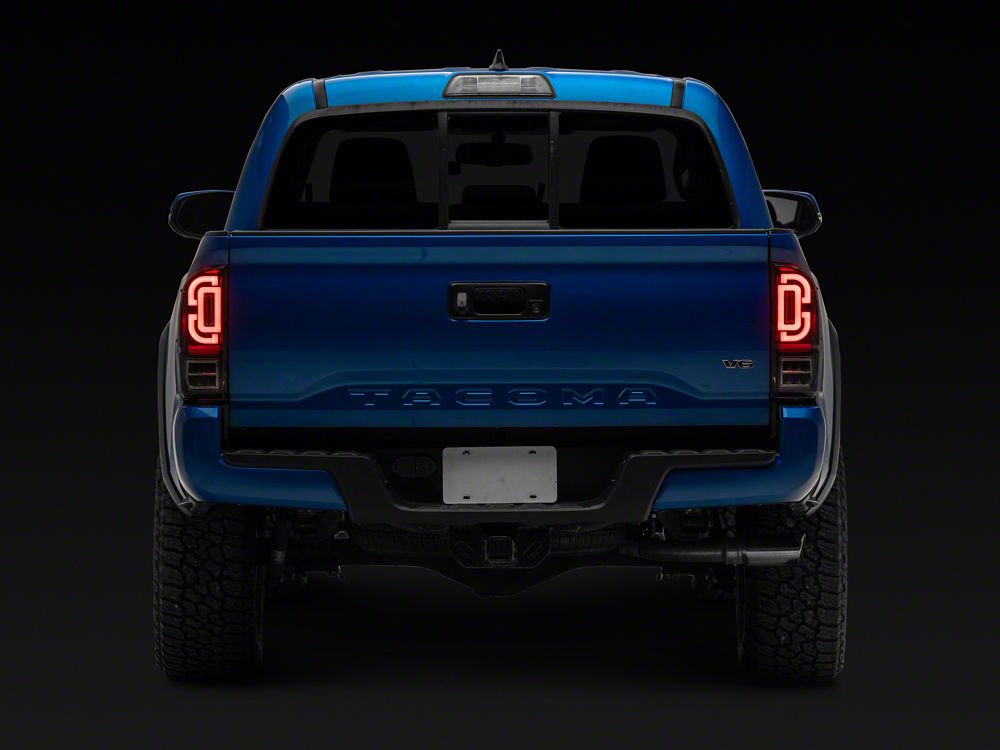 Raxiom XW Series Sequential LED Tail Lights; Black Housing; Clear Lens (16-23 Tacoma)