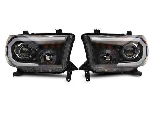 Raxiom Axial Series Projector Headlights with Sequential LED Bar; Black Housing; Clear Lens (07-13 Tundra w/o Level Adjuster)