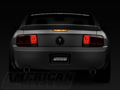 Raxiom Tail Lights and Sequential Tail Light Kit; Black Housing; Smoked Lens (05-09 Mustang)