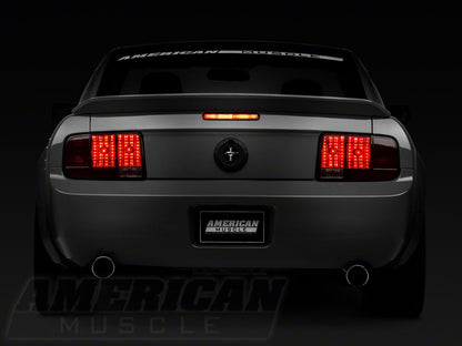 Raxiom Tail Lights and Sequential Tail Light Kit; Black Housing; Smoked Lens (05-09 Mustang)
