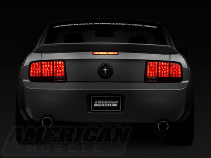 Raxiom Tail Lights and Sequential Tail Light Kit; Black Housing; Smoked Lens (05-09 Mustang)