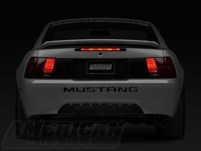 Raxiom Tail Lights and Sequential Tail Light Kit; Black Housing; Smoked Lens (99-04 Mustang, Excluding 99-01 Cobra)
