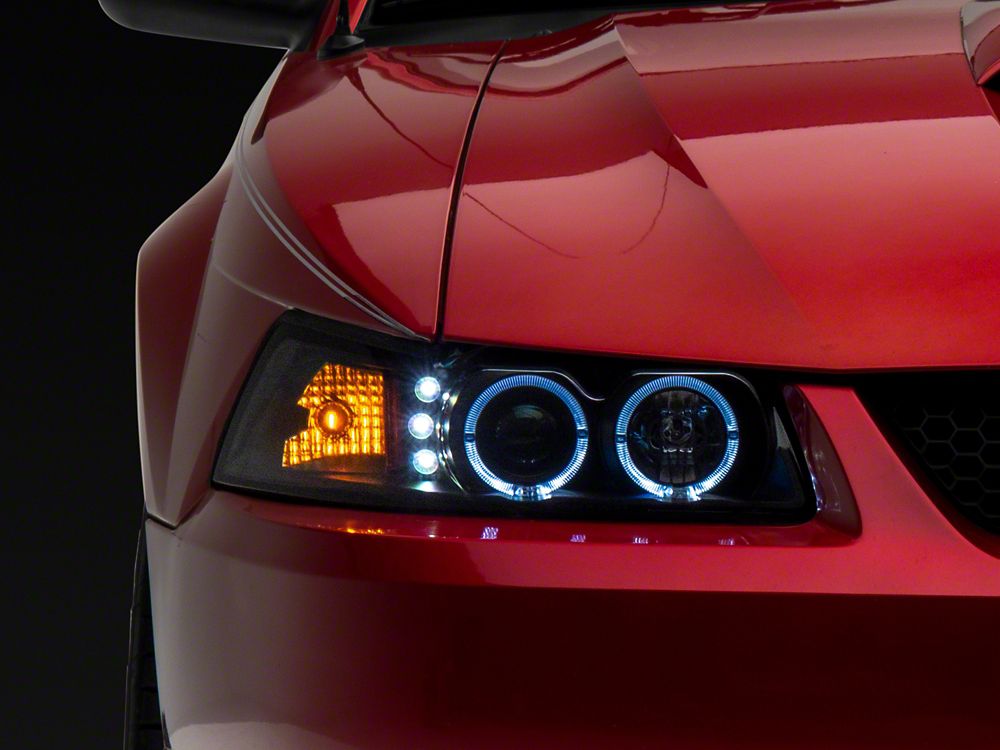 Raxiom Dual LED Halo Projector Headlights; Black Housing; Clear Lens (99-04 Mustang)