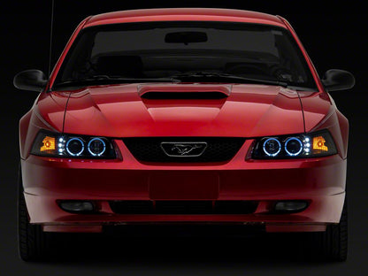Raxiom Dual LED Halo Projector Headlights; Black Housing; Clear Lens (99-04 Mustang)