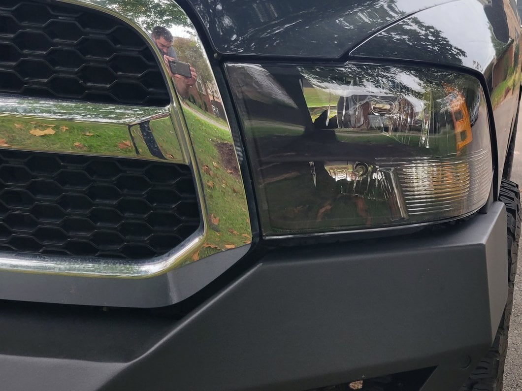 Raxiom Axial Series Euro Style Headlights with Dual Bulb; Black Housing; Clear Lens (09-18 RAM 1500 w/ Factory Halogen Non-Projector Headlights)