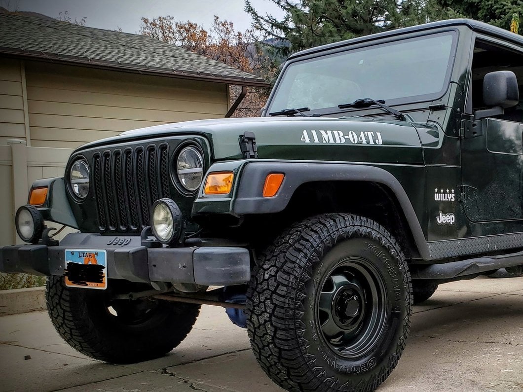 Raxiom Axial Series 7-Inch LED Headlights with DRL and Signal Function; Black Housing; Clear Lens (97-18 Jeep Wrangler TJ & JK)