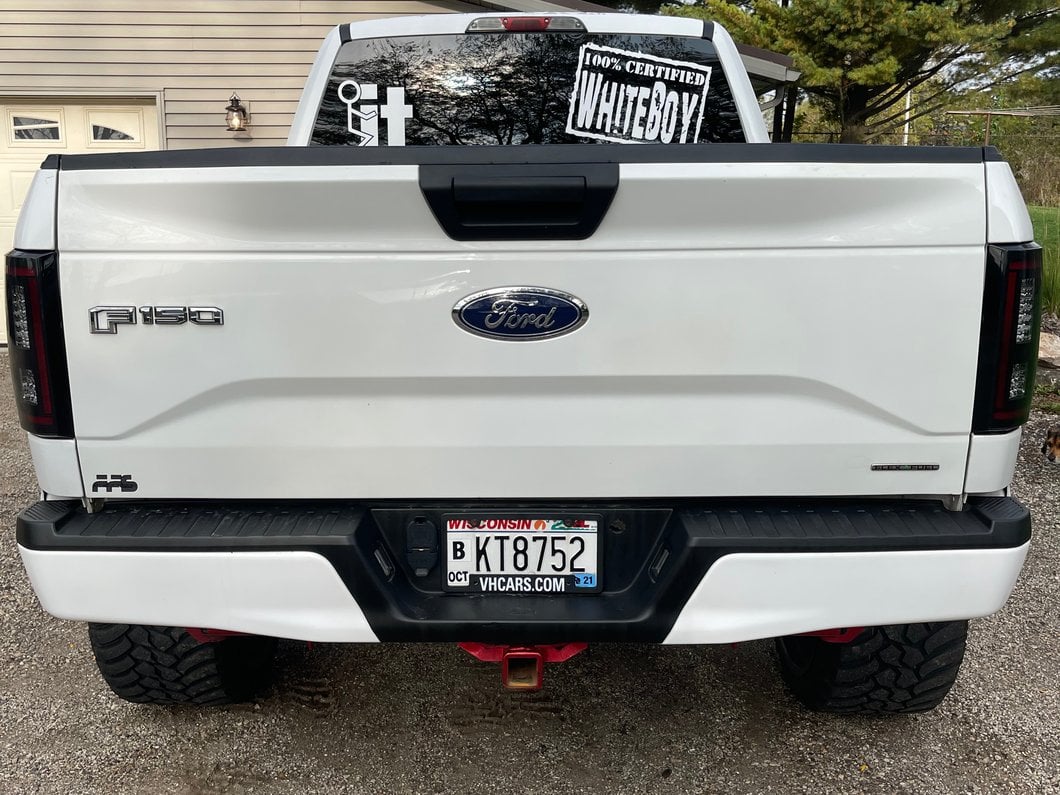 Raxiom LED Tail Lights with Sequential Turn Signals; Black Housing; Smoked Lens (15-17 F-150 w/ Factory Halogen Non-BLIS Tail Lights)
