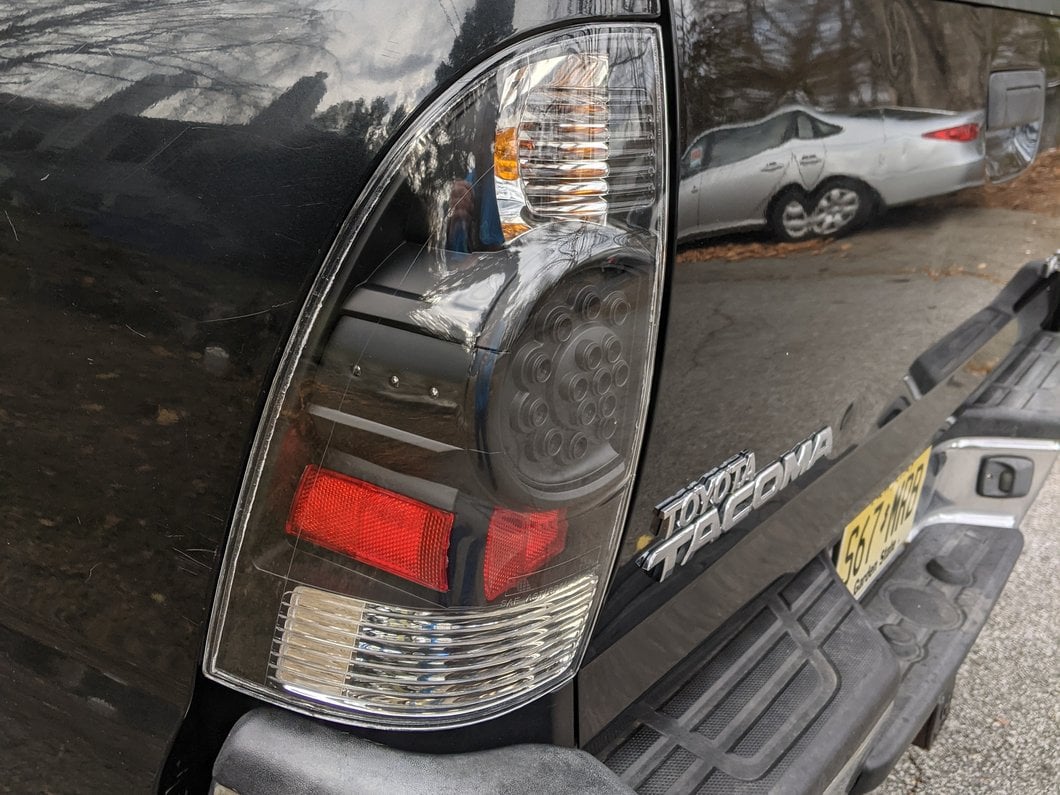 Raxiom LED Tail Lights; Black Housing; Red/Clear Lens (05-06 Tacoma)
