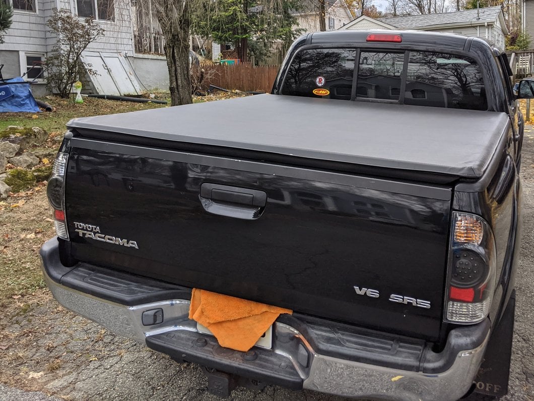 Raxiom LED Tail Lights; Black Housing; Red/Clear Lens (05-06 Tacoma)