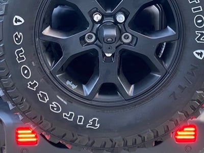 Raxiom Axial Series LED Rear Bumper Reflector Lights; Smoked (18-25 Jeep Wrangler JL Moab, Rubicon, Sahara)