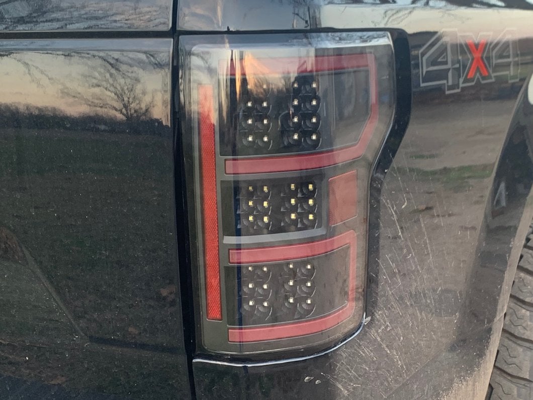 Raxiom LED Tail Lights; Black Housing; Clear Lens (18-20 F-150 w/ Factory Halogen Non-BLIS Tail Lights)