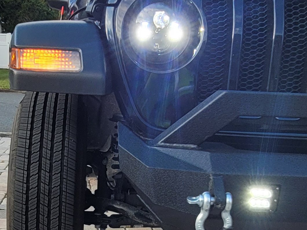 Raxiom Axial Series 7-Inch LED Daymaker Headlights with Headlight Adapter; Black Housing; Clear Lens (18-25 Jeep Wrangler JL)