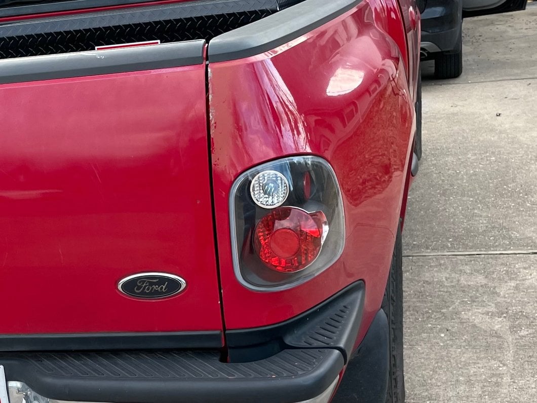 Raxiom Axial Series Version 2 Tail Lights; Black Housing; Red/Clear Lens (97-00 F-150 Flareside)